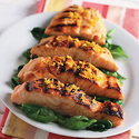 Orange-Glazed Salmon over Sauteed Spinach